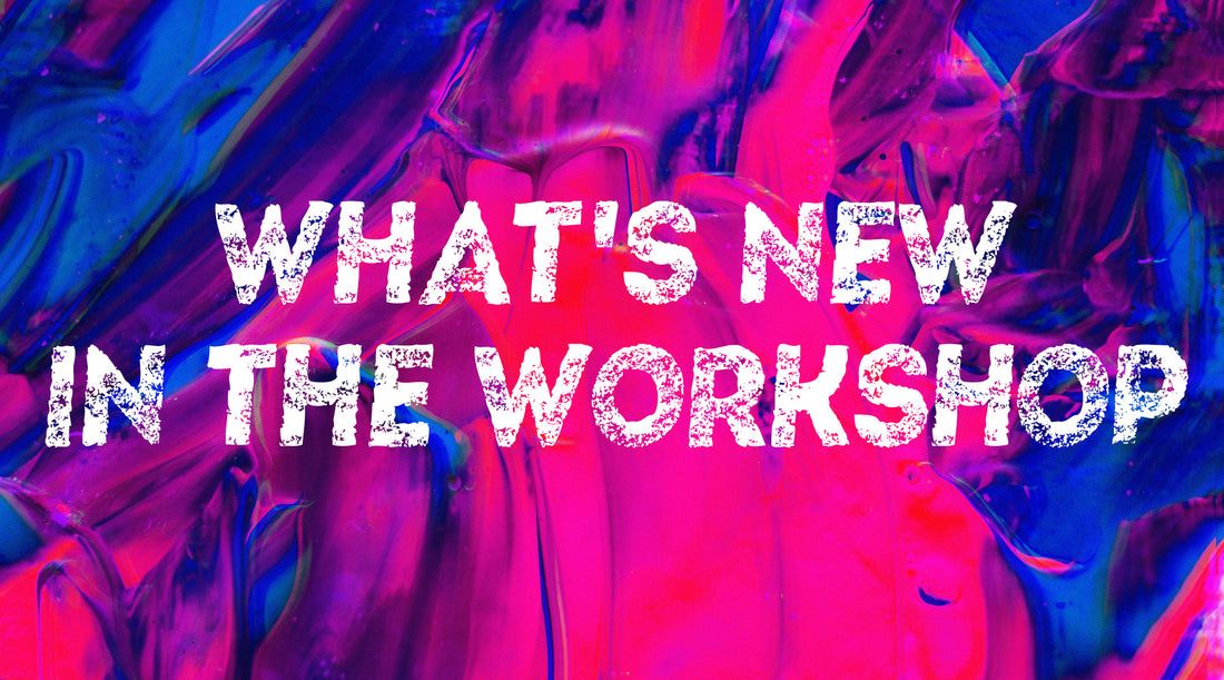 Pink and purple abstract painting with white text reading "What's New in the Workshop"