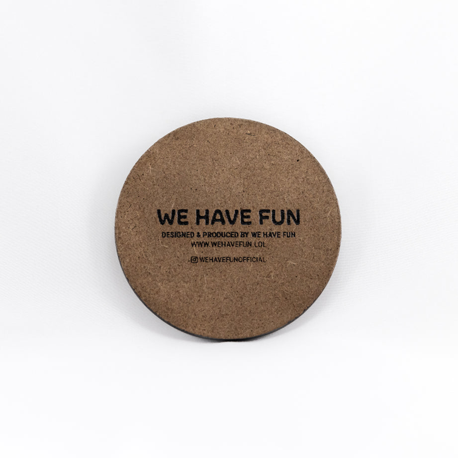 Back of the coaster engraved with "We Have Fun" logo, "Designed and produced by We Have Fun", "www.wehavefun.lol", and instagram bio link "wehavefunofficial".