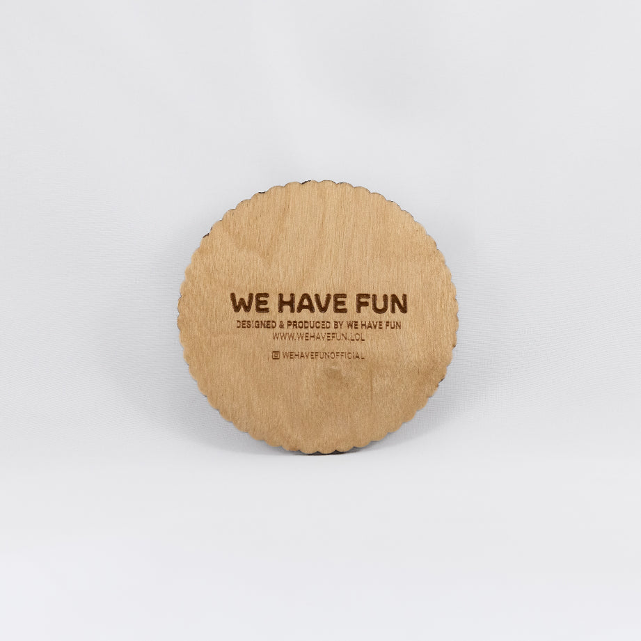 Back of the circular Baltic birch crystal grid with "We Have Fun" logo, "Designed and produced by We Have Fun", "www.wehavefun.lol", and instagram bio link "wehavefunofficial" engraved on the back.